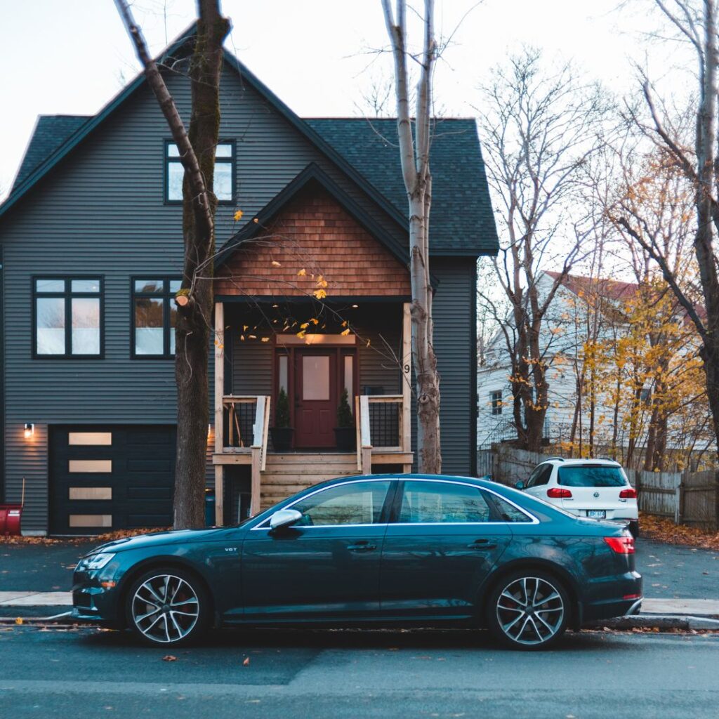 car parked in front of a house