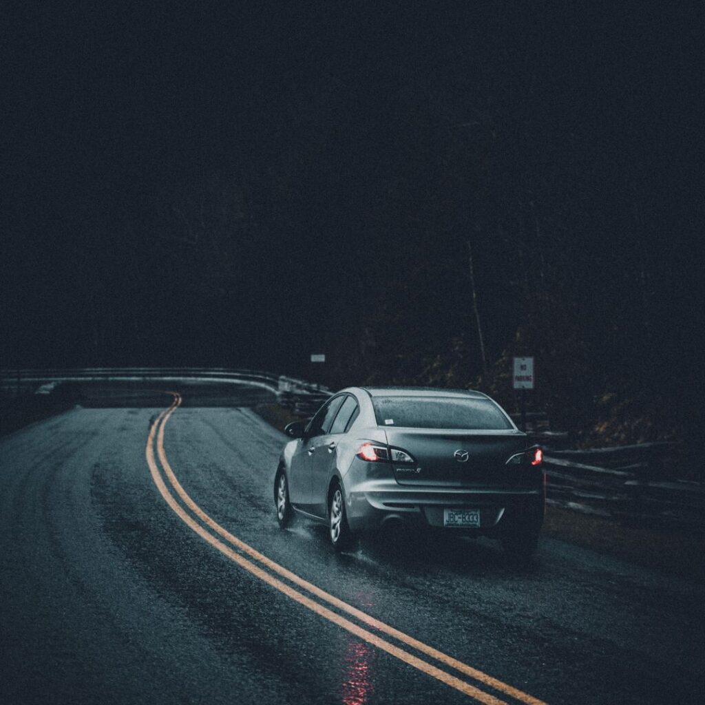 car driving in the rain